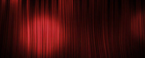 istock Red curtain background with spotlight 1328687851