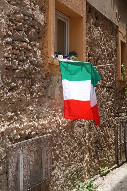 istock italian flag hanging from windowsill 1328690668