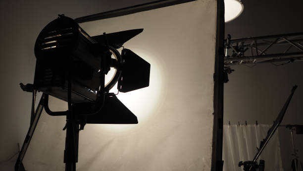 istock Studio light equipments for photo or film movie video. Light set for professional shooting studio background. LED Flood light and Spot light for video production studio. Setup include Barn door softbox. 1328696607
