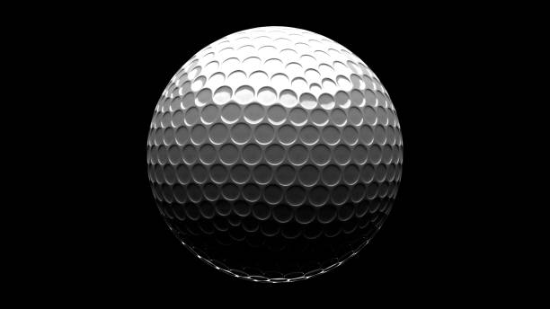 istock White golf ball isolated on black background. 1328700459