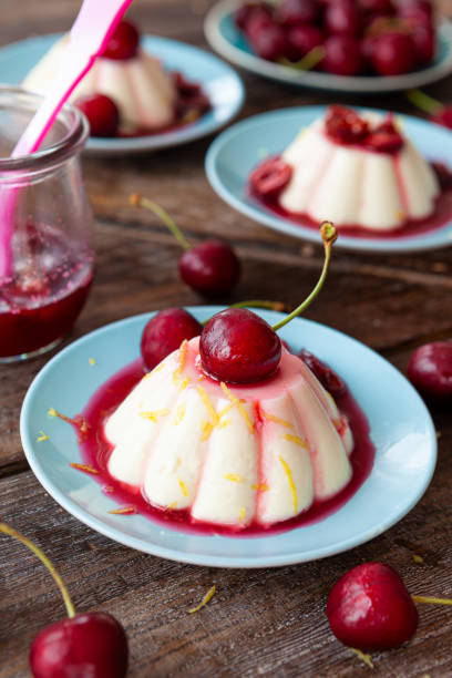 istock Panna cotta with cherries 1328705593