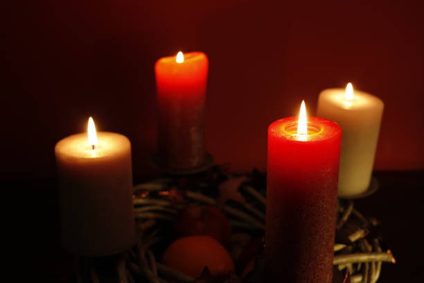 istock Advent wreath with 4 burning candles. 1328709926