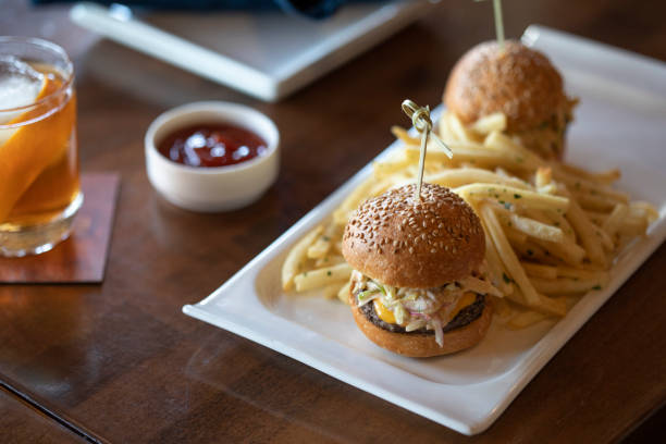 Mini burgers and french fries on a plate at a restaurant Mini burgers and french fries on a plate at a restaurant in Chandler, AZ, United States chandler arizona stock pictures, royalty-free photos & images