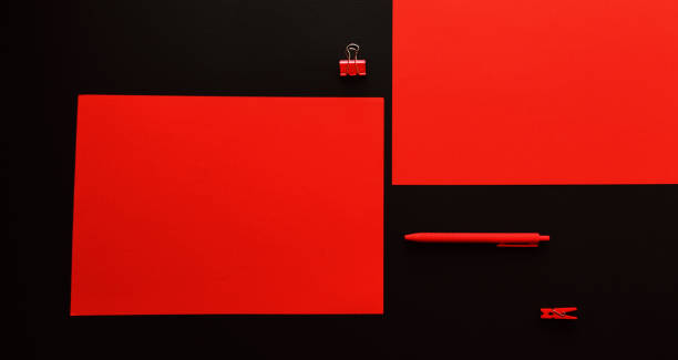 istock Red paper, pen and clips 1328714267