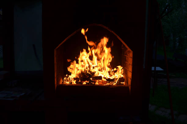 istock Bright fire with many flames in a brick furnace 1328715957