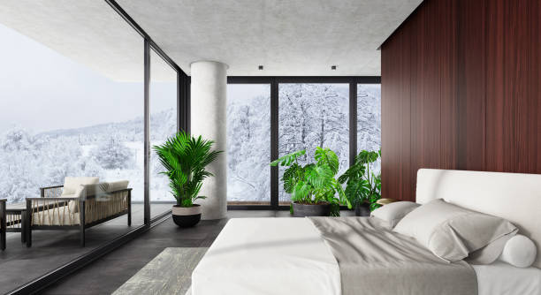istock Luxury Hotel Modern interior bedroom with large windows. Winter scene mountain forest.. 1328718949