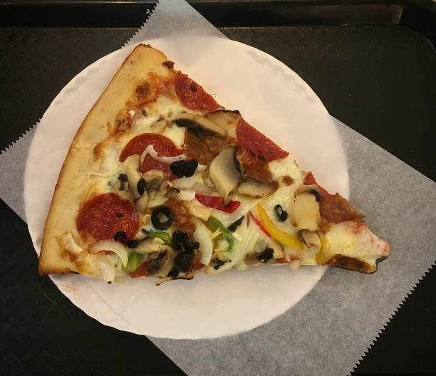 istock A delicious slice of pizza. 1328720293