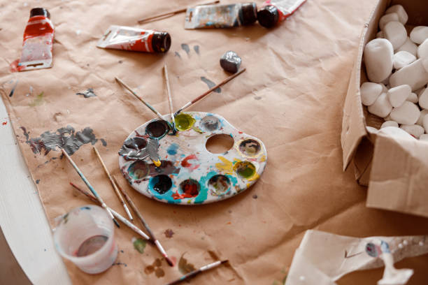 istock Creation process of watercolor painting in studio 1328720439