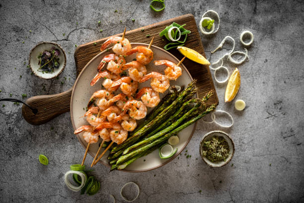 diverse keto dishes - grilled shrimp imagens e fotografias de stock