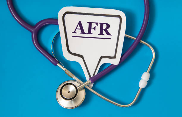 istock AFR - acronym on white figure sheet on a blue background with a stethoscope 1328725392