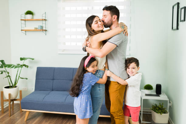 istock Husband telling his family he loves them 1328730227