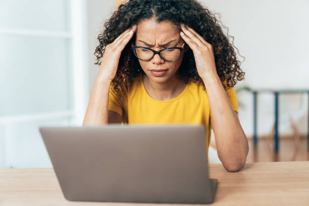istock Business woman with headache 1328730709