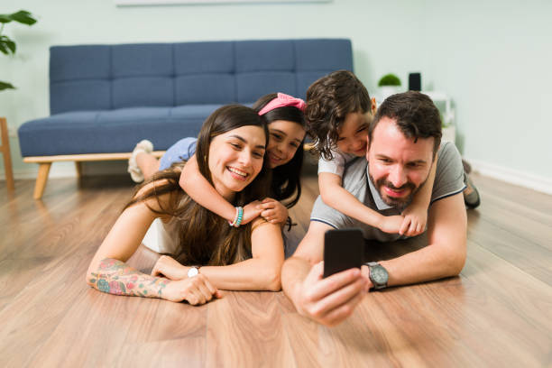 istock Happy father posting a picture on social media 1328731503