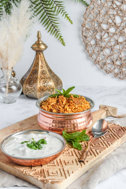 Traditional Lamb Biriyani mutton with yogurt dip raita