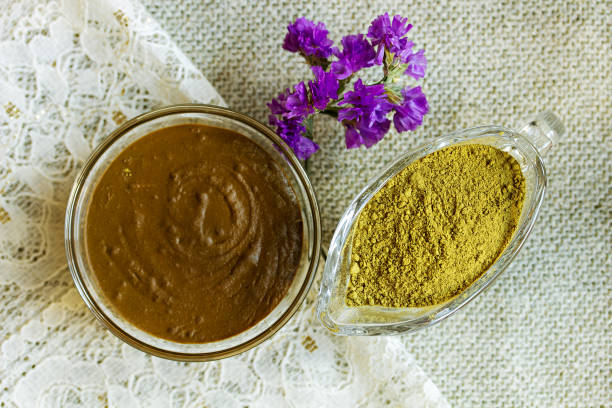 Henna powder. Henna paste. Prepare the henna paste at home. Henna powder. Henna paste. Prepare the henna paste at home. Focus on the powder henna stock pictures, royalty-free photos & images