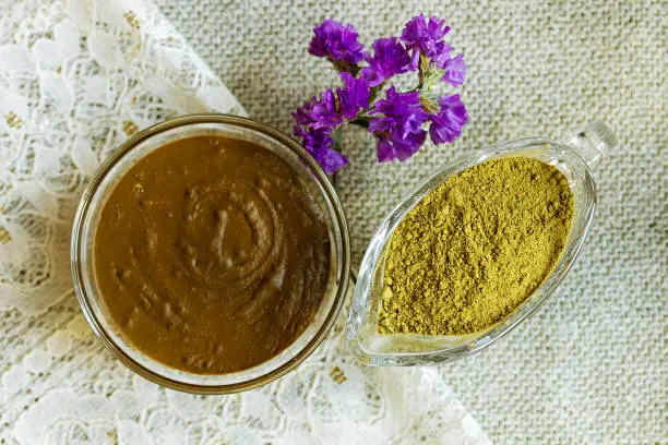 Henna powder. Henna paste. Prepare the henna paste at home. Focus on the powder