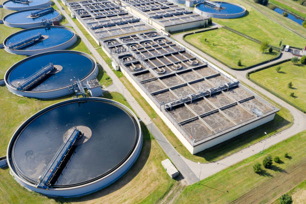 Modern Sewage Treatment Plant, Aerial View Aerial view of a modern sewage treatment plant. public utility stock pictures, royalty-free photos & images