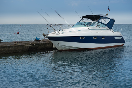 The boat is at the pier in the resort village of Nebug, Krasnodar Territory