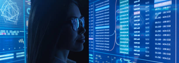 istock The businesswoman works with blue screen 1328751000
