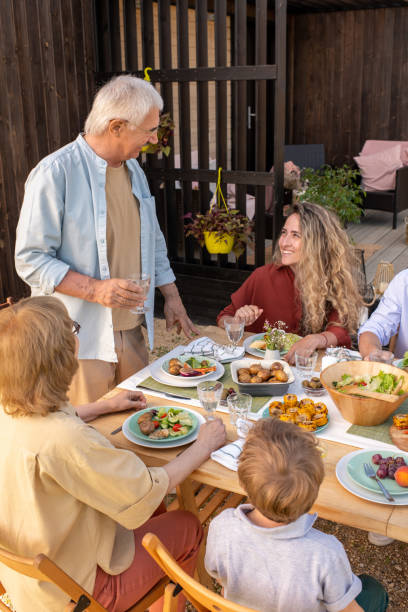 istock Father Giving Toast at Birthday Party 1328754612