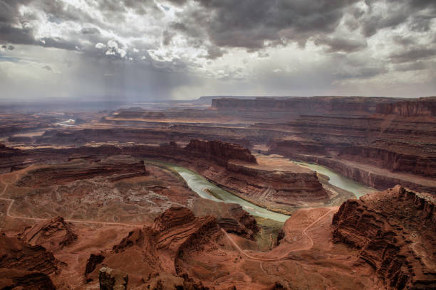 istock Clouds over Canyonlands National Park and the Colorado River 1328760179