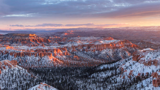 istock Sunrise over snowy Bryce Canyon 1328760252