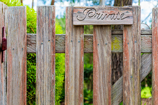 Wooden Private sign, on a wooden fence