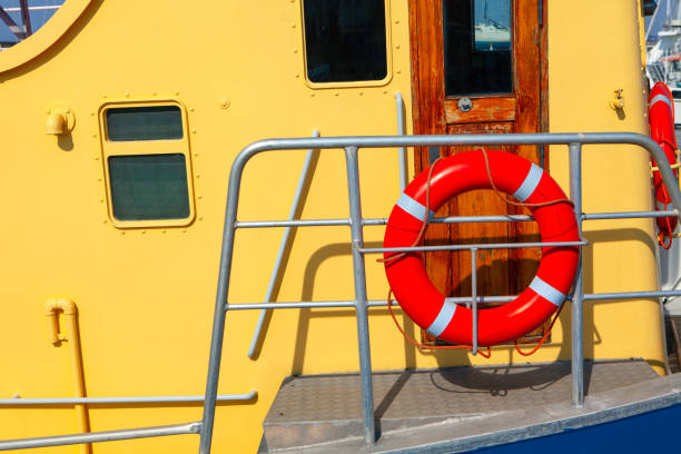 Lifebuoy on board the ship . Red Lifebuoy