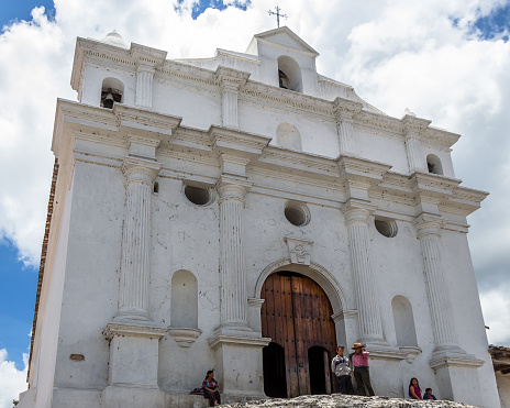 Chichicastenango, Guatemala – August 14, 2015 – The Iglesia de Santo Tomás (Church of Saint Thomas) is a Roman Catholic church located in the market place of the town which is known for its pottery. It was built around 1545 atop a Pre-Columbian temple platform (source: Wikipedia)