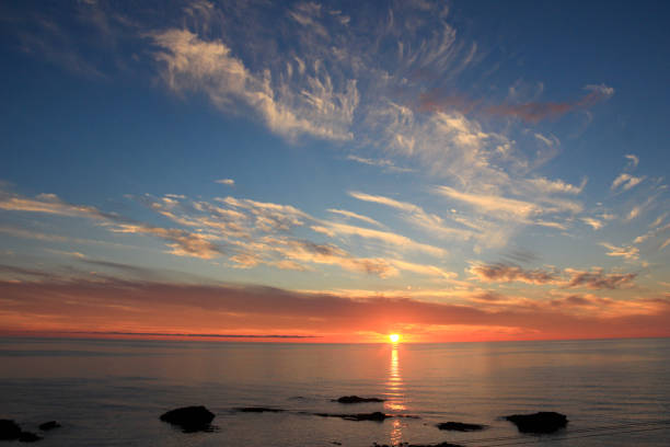 istock The sea shining in the evening sun 1328784898