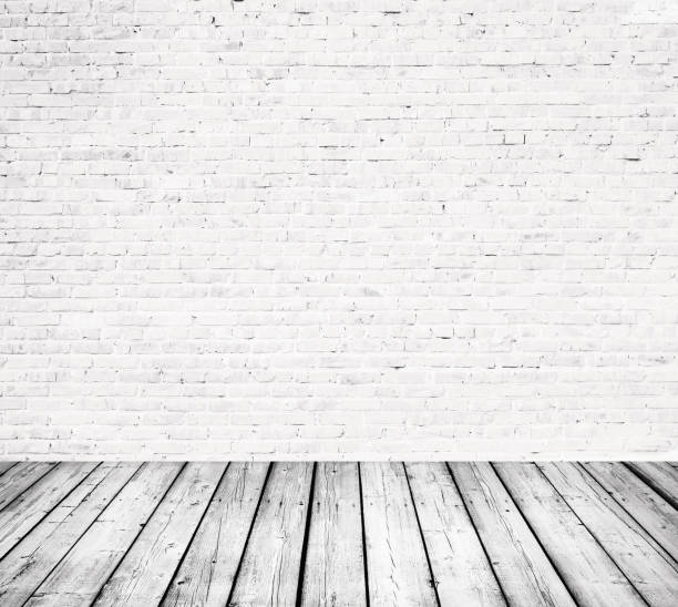 istock Interior room with white brick wall and wooden floor 1328786802