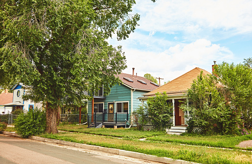 Quaint established residential neighborhood in Colorado USA. Sunny summer day.