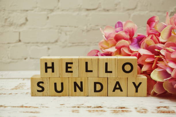 istock Hello Sunday alphabet letter on wooden background 1328789394