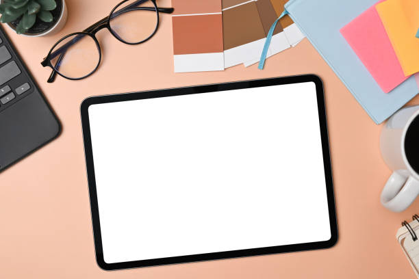 istock Flat lay creative workspace with digital tablet, glasses and color swath. 1328791402