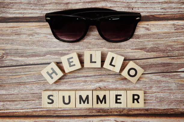 istock Hello Summer message alphabet letter on wooden background 1328793984