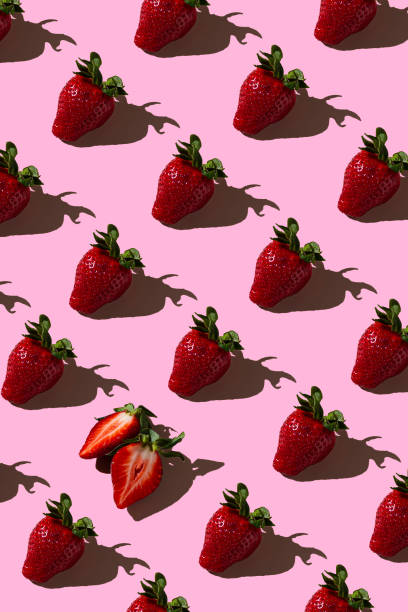 istock Colorful pattern of strawberries on pink background. Top view 1328795847