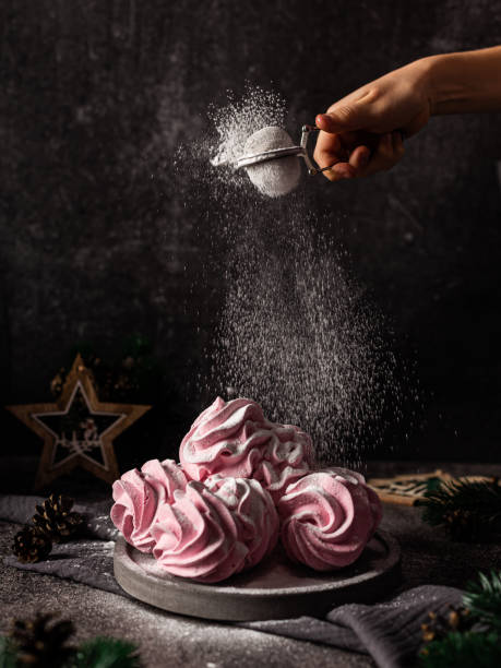 istock Marshmallow - marshmallow on a dark background. Pink fluffy marshmallow with strawberry flavor. 1328795856