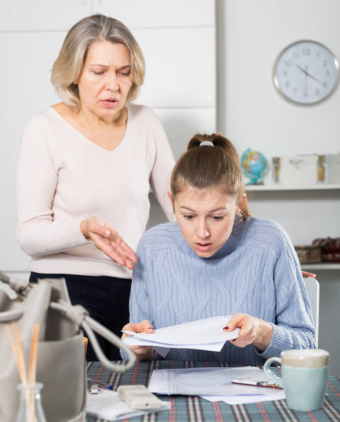istock Woman disagree with daughter for documents 1328797215