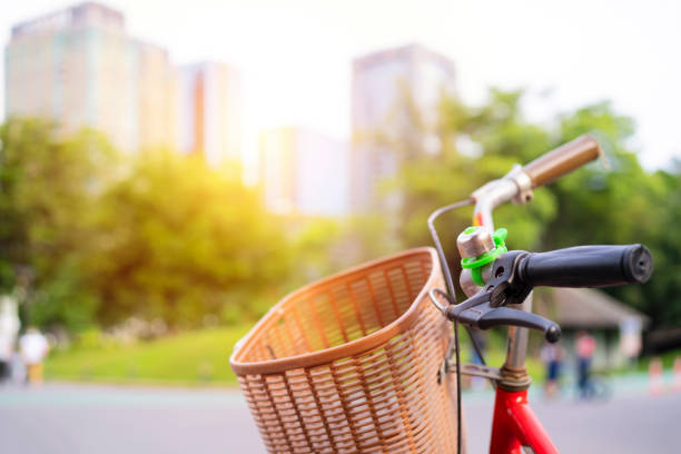 istock Red bicycle in fresh summer park 1328798335