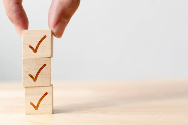 istock Checklist concept, Check mark on wooden blocks on table with copy space 1328798760
