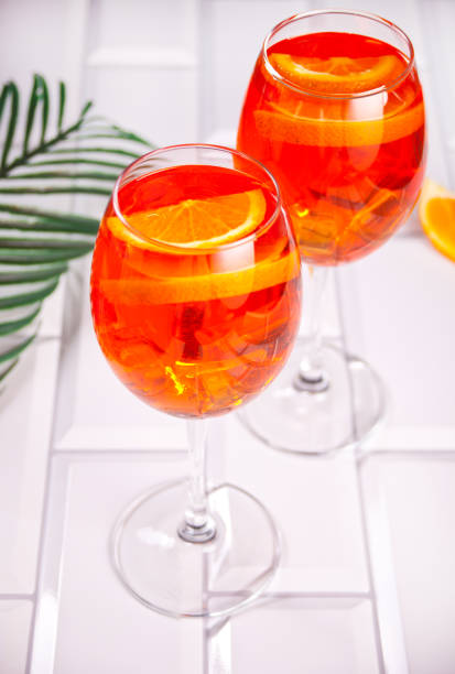 istock Spritz Italian cocktail alcoholic beverage with ice cubes and oranges. 1328800947