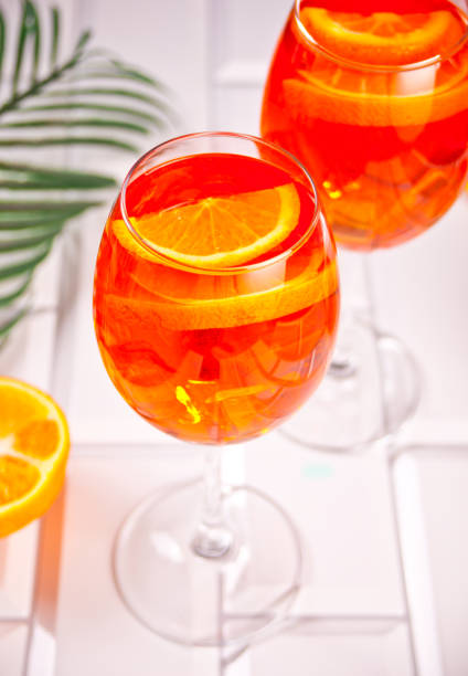 istock Spritz Italian cocktail alcoholic beverage with ice cubes and oranges. 1328801059