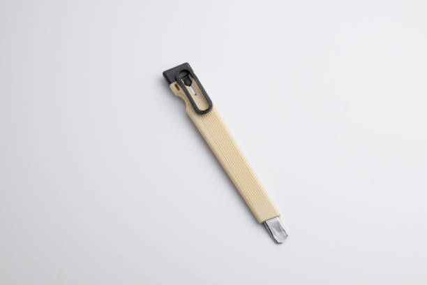 istock Used cutter knife on a white background 1328801276