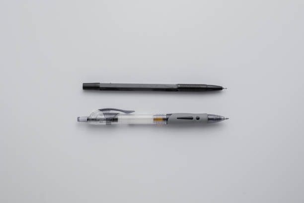 istock Used ballpoint pen on white background 1328801987
