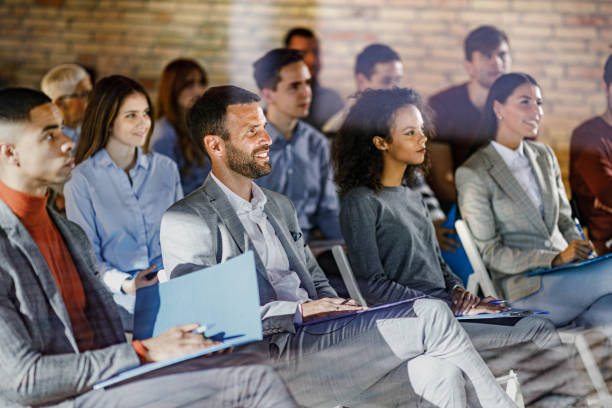 istock Congratulating on successful business seminar! 1328804717