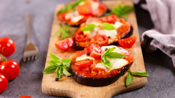 istock eggplant pizza with tomato sauce,  mozzarella and basil 1328806766