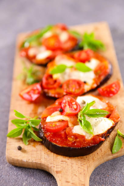 istock eggplant pizza with tomato sauce,  mozzarella and basil 1328806769