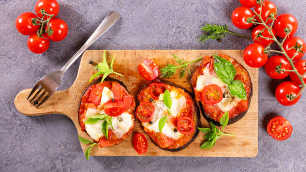 istock eggplant pizza with tomato sauce,  mozzarella and basil 1328806792
