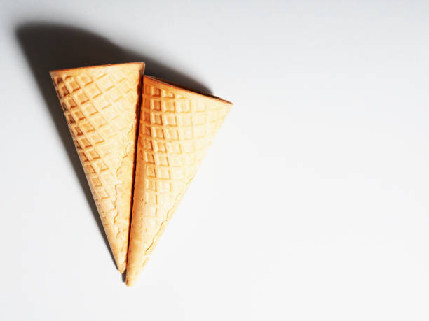 istock two waffle cups for ice cream on a colored background, minimalism style 1328806861