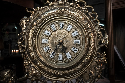 Antique brass fireplace clock.  Antiquities item